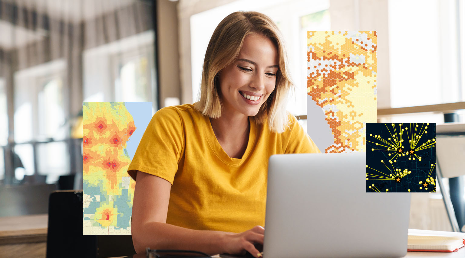 A woman smiles while looking at a laptop, with images of maps superimposed